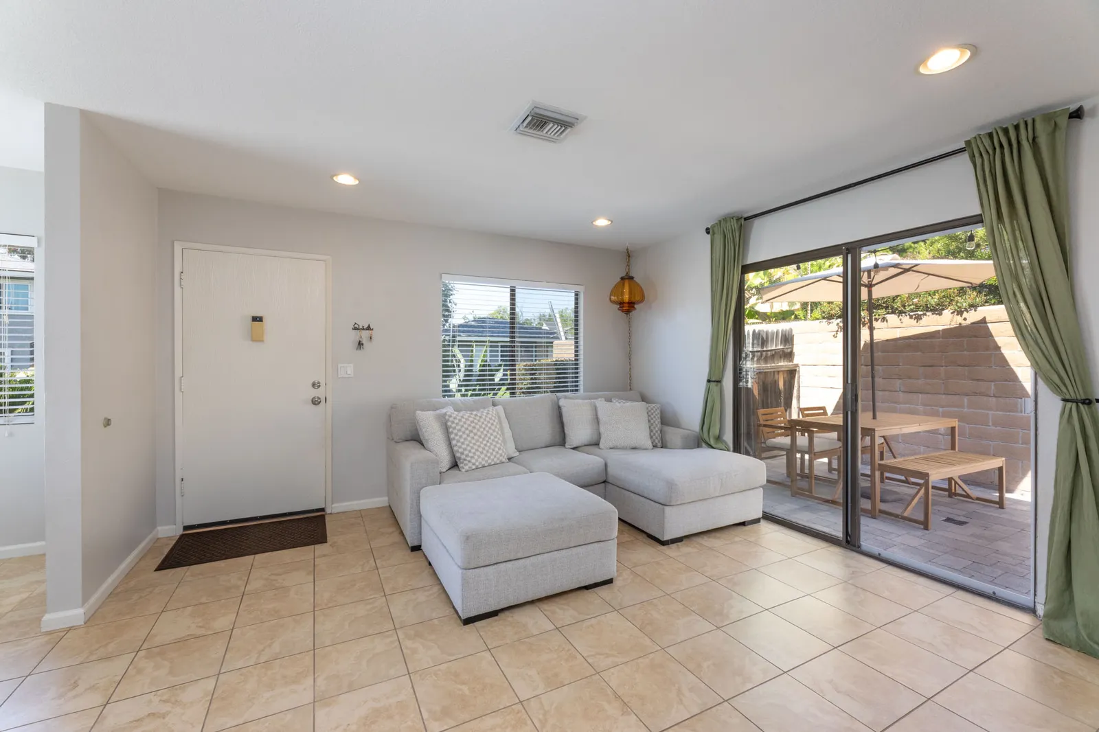 Living room with sliding door to the patio