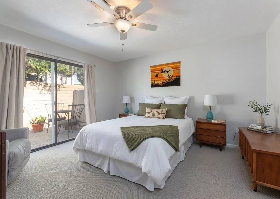 Primary bedroom with sliding door to the patio
