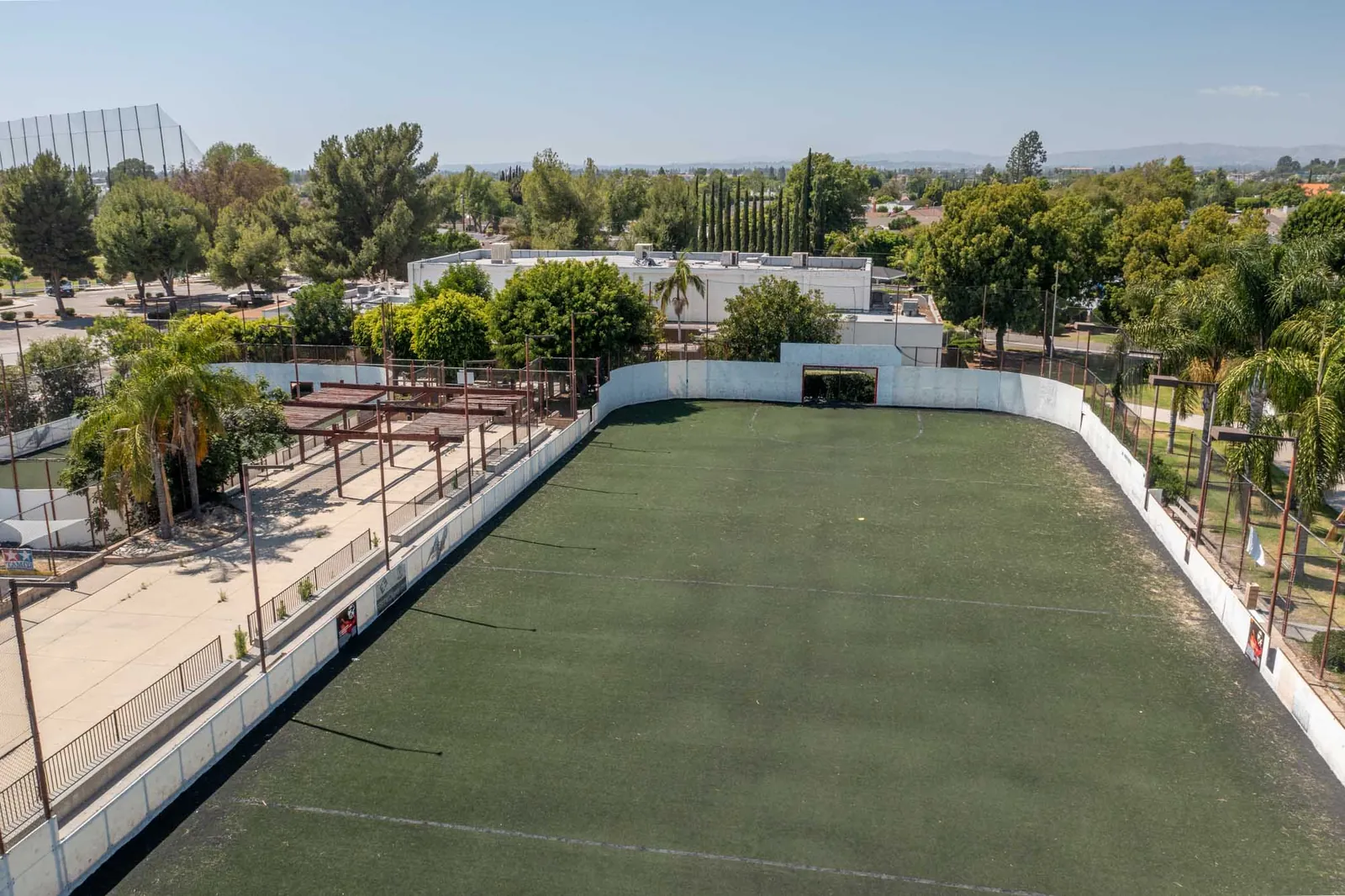 Aerial view of a nearby park lawn area