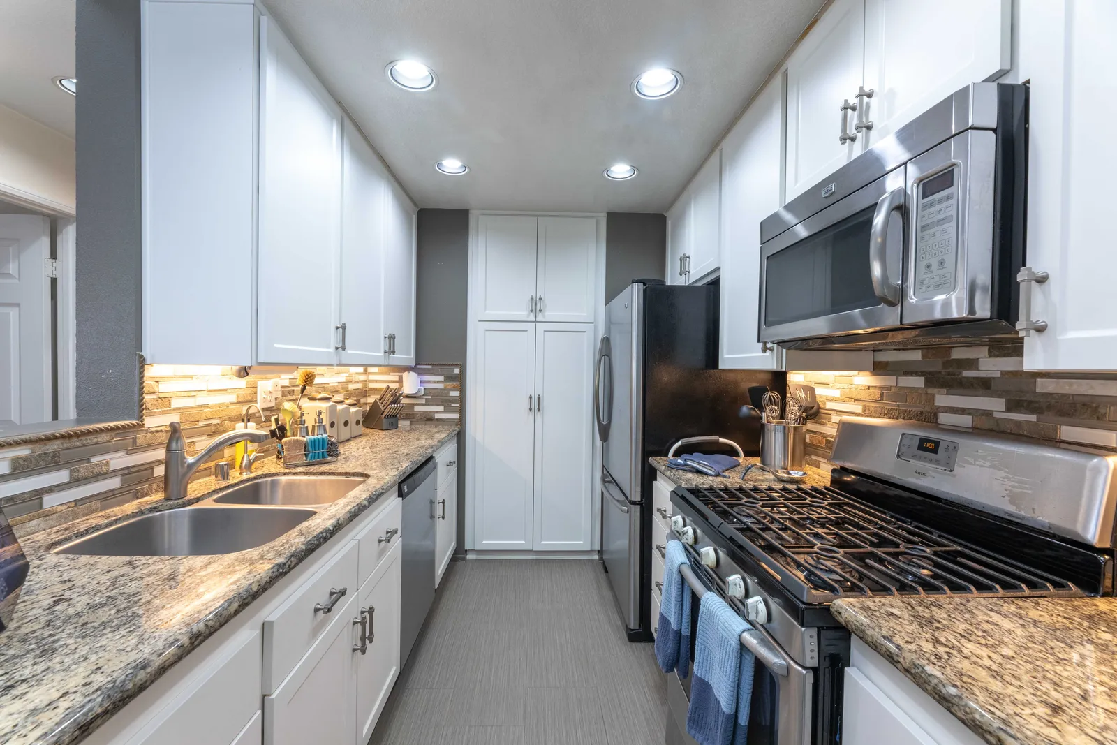 Kitchen with granite and stainless steel