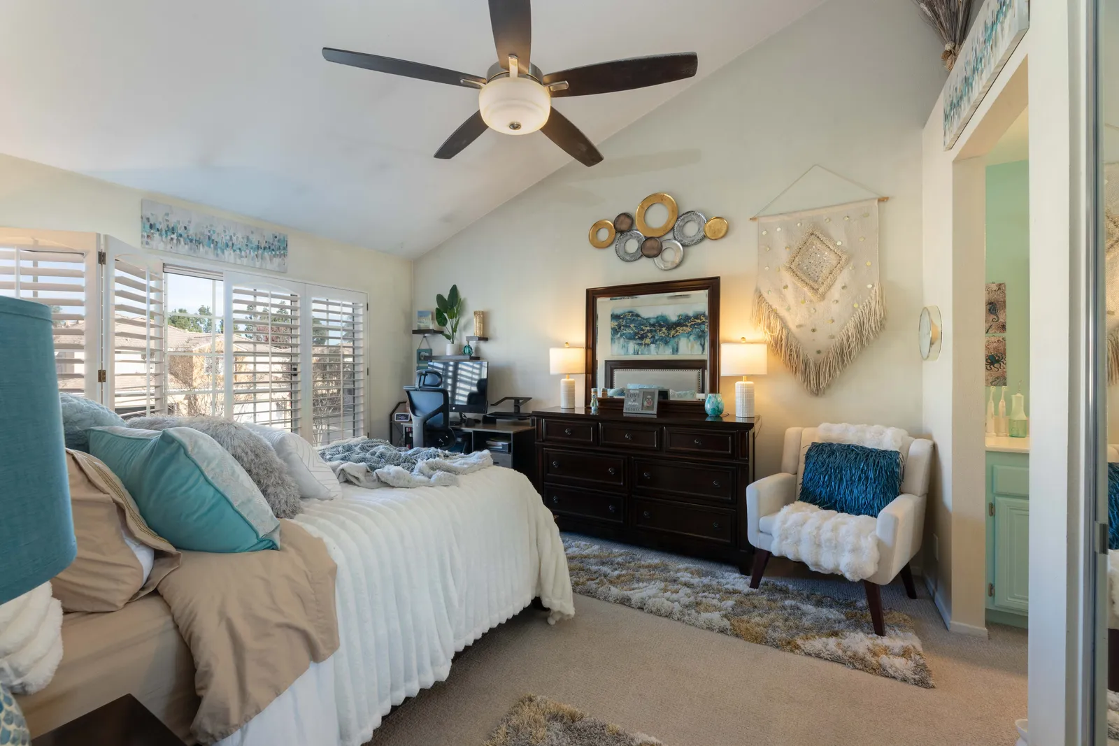 Primary suite with vaulted ceiling
